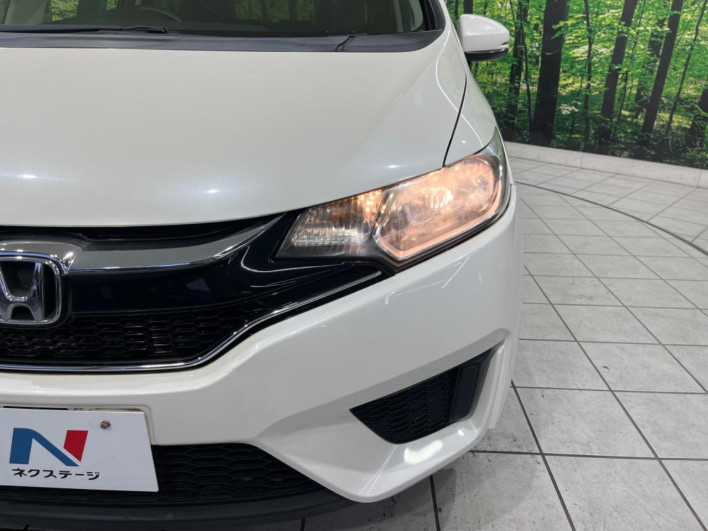 2016 Honda Fit DBA-GK3 (UW-69f6bbfb3f75a)[24]